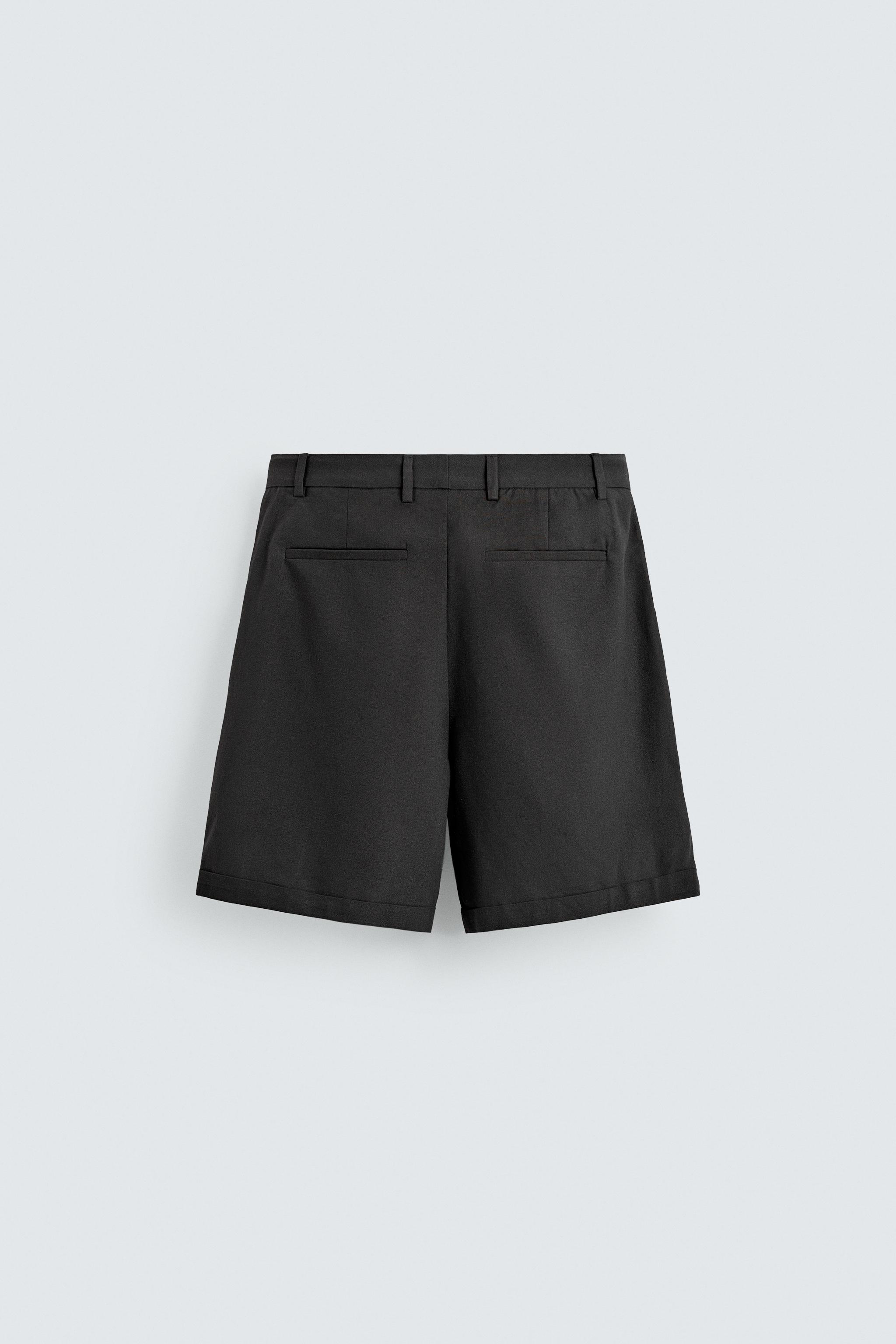 RELAXED FIT PLEATED SHORTS